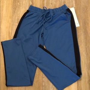 Quench wear joggers blue with black strip size S